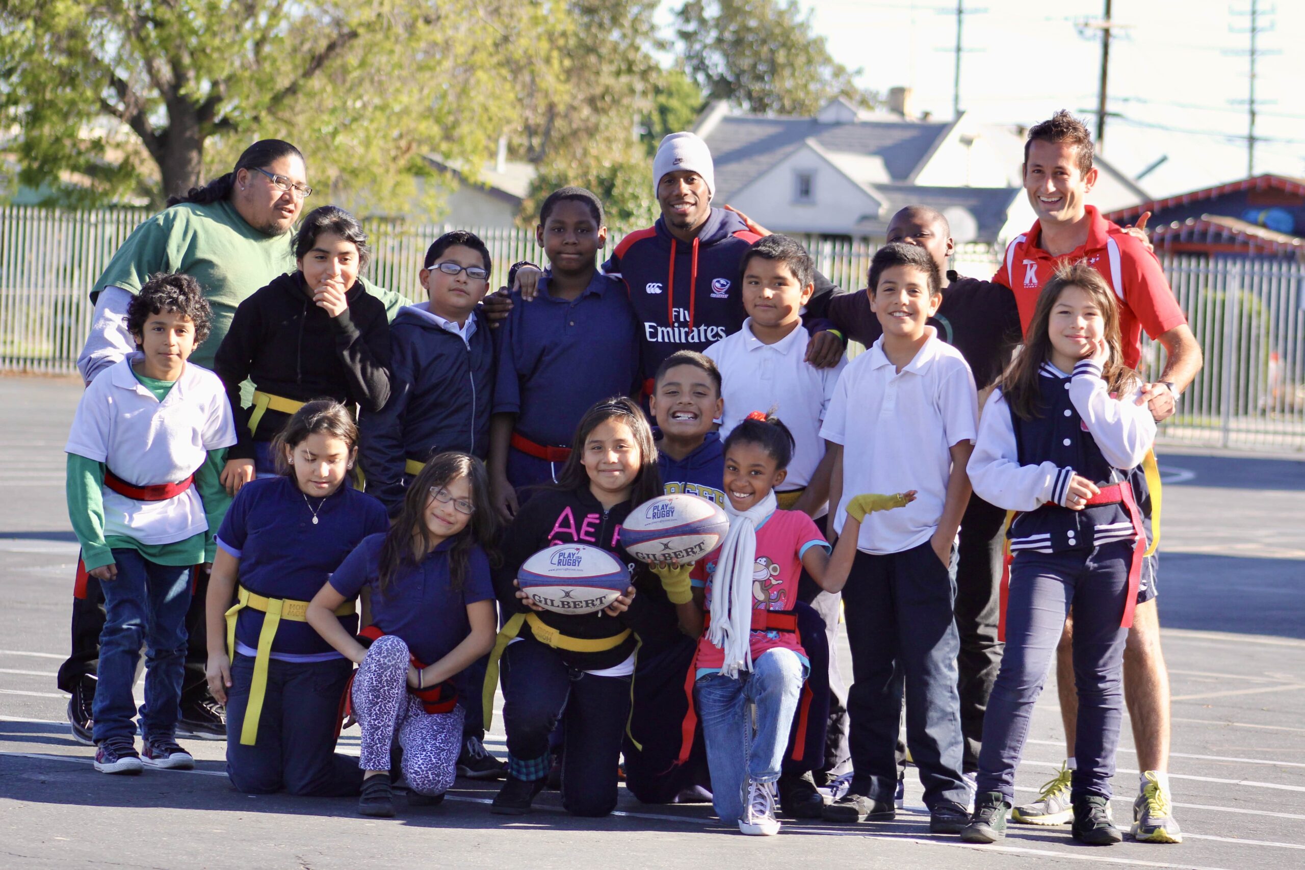 Dallen Stanford with a group at a rugby event