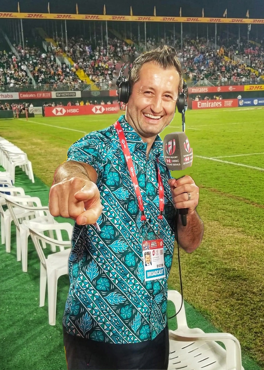 Dallen Stanford pointing with a microphone