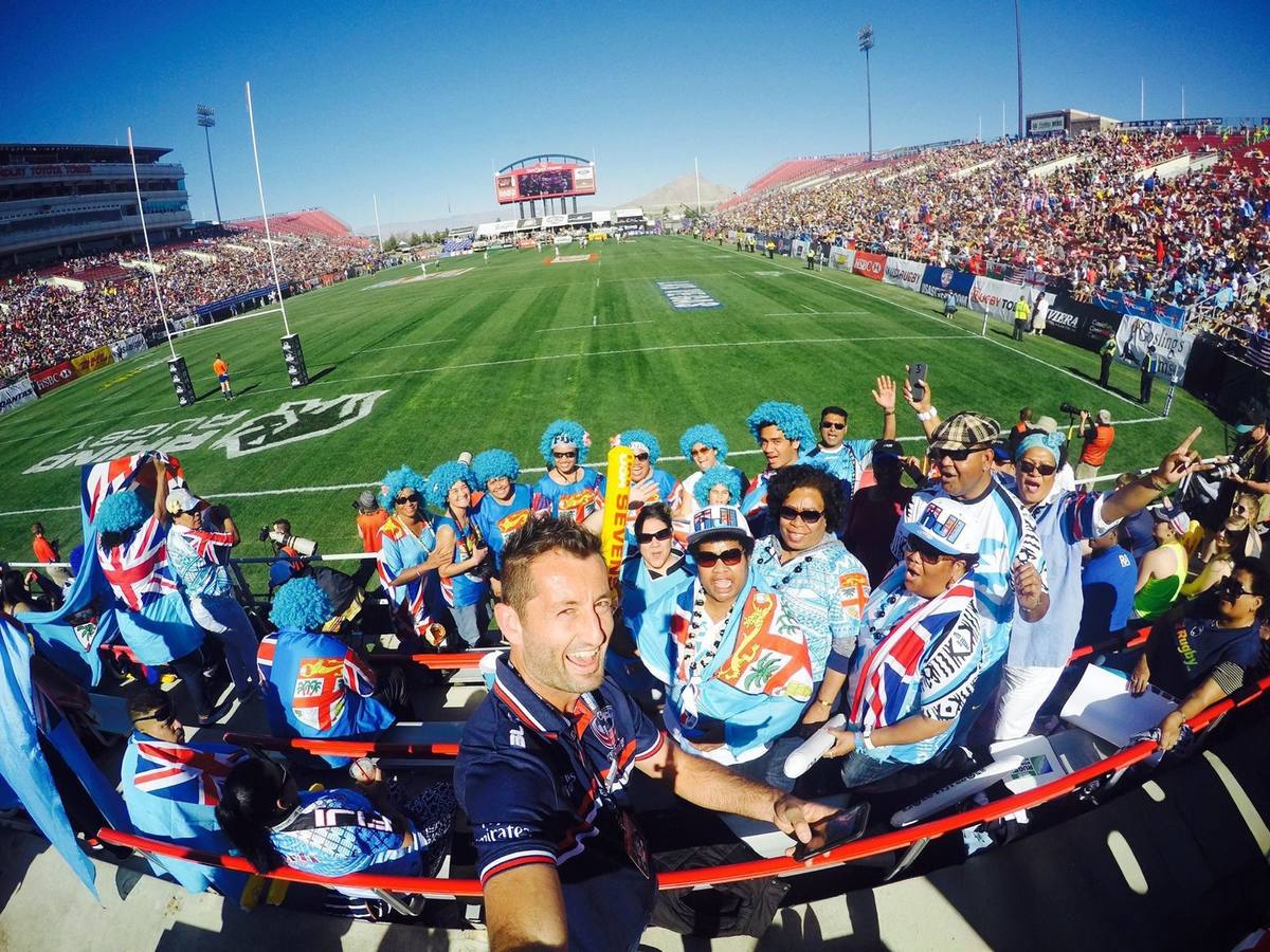Dallen Stanford with fans in the stands at a rugby sevens tournament